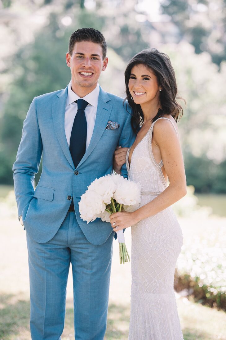 Michael's light blue suit (worn with a pocket square instead of a boutonniere) was a relaxed yet refined complement to Molly's form-fitting, beaded Inbal Dror gown.