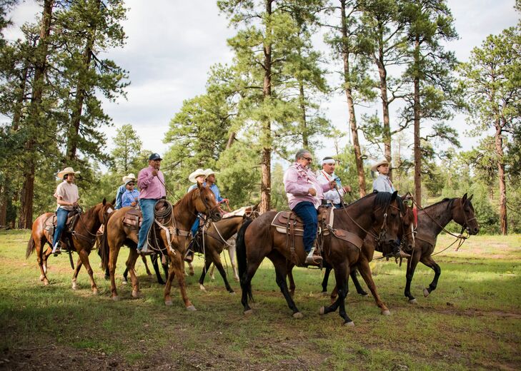 Traditional Native American Groom on Horseback Before Wedding With Family