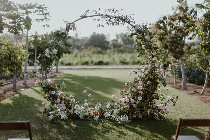 Circular Wedding Arch with Pink Flowers and Greenery