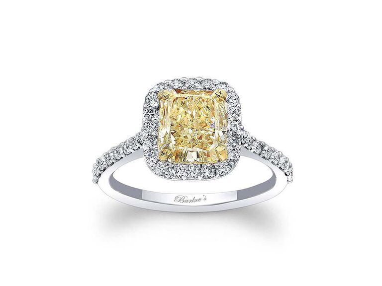 barkev's cushion cut yellow diamond engagement ring with yellow gold claw prongs round diamond halo diamond encrusted sides and plain white gold band