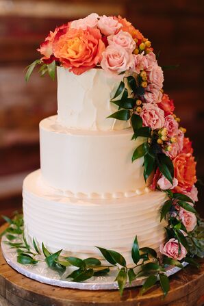 Wedding Cake Accented with Coral and Pink Roses