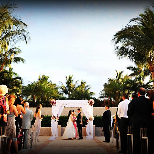 In order for Aileen's Spanish-speaking, Cuban relatives to understand the ceremony, her mother (who also walked her down the aisle with her father) and uncle read Sonnet XVII, by Pablo Neruda in Spanish and English.
