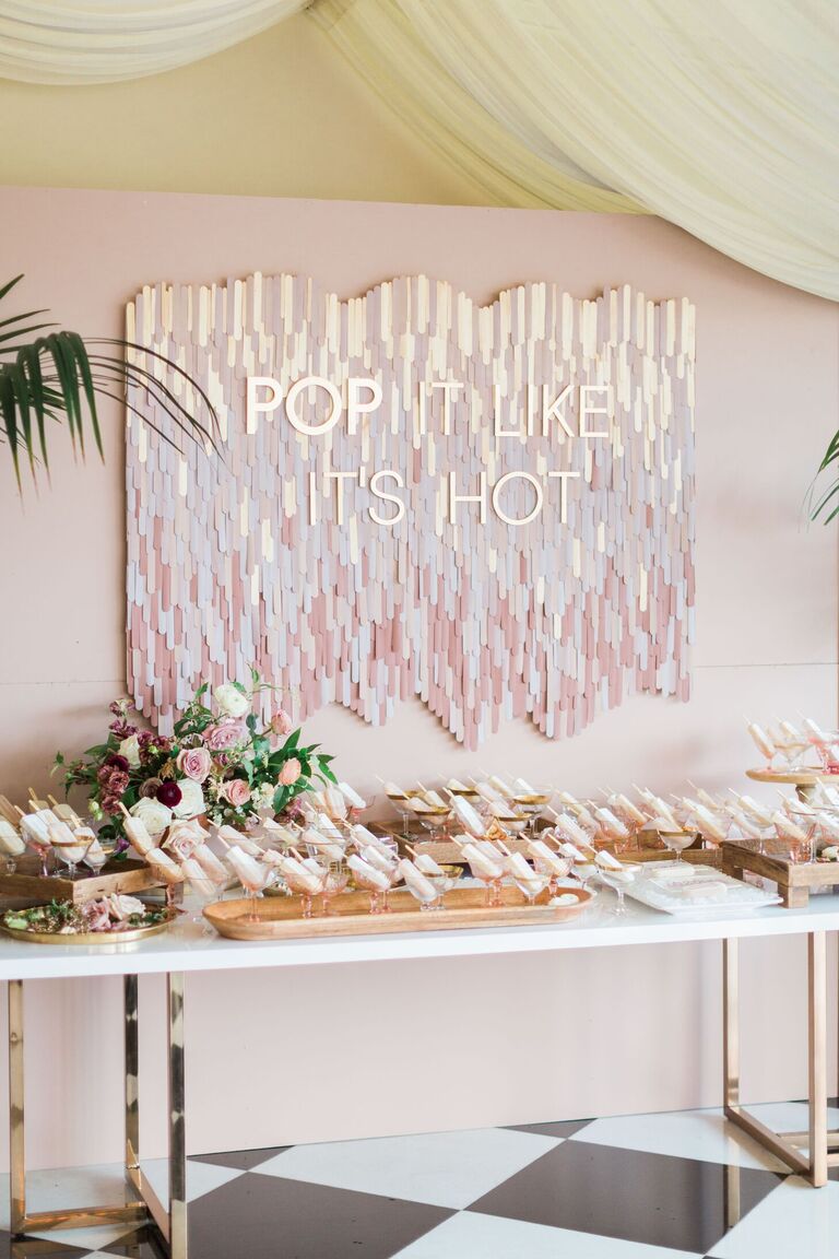 Pink popsicle escort card display