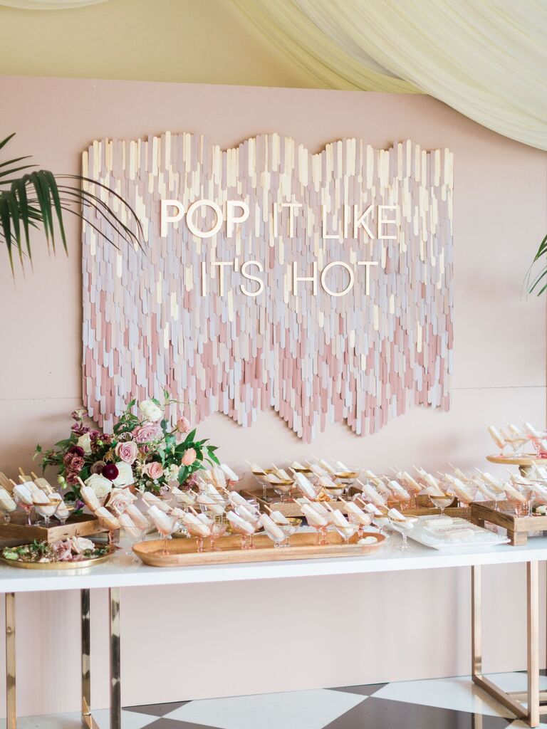 Pink popsicle escort card display