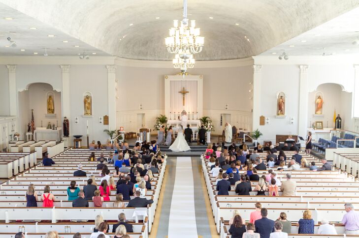 Lauren and Francis said "I do" in a traditional ceremony at St. John the Baptist Church in Kenmore, New York. "The church was only a few blocks from where we both grew up," Lauren says. "Francis and I both attended Catholic school, so the church was very meaningful for both our families."