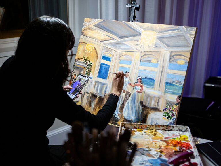 Live wedding painter at wedding reception