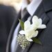 White Freesia and Seeded Eucalyptus Boutonniere