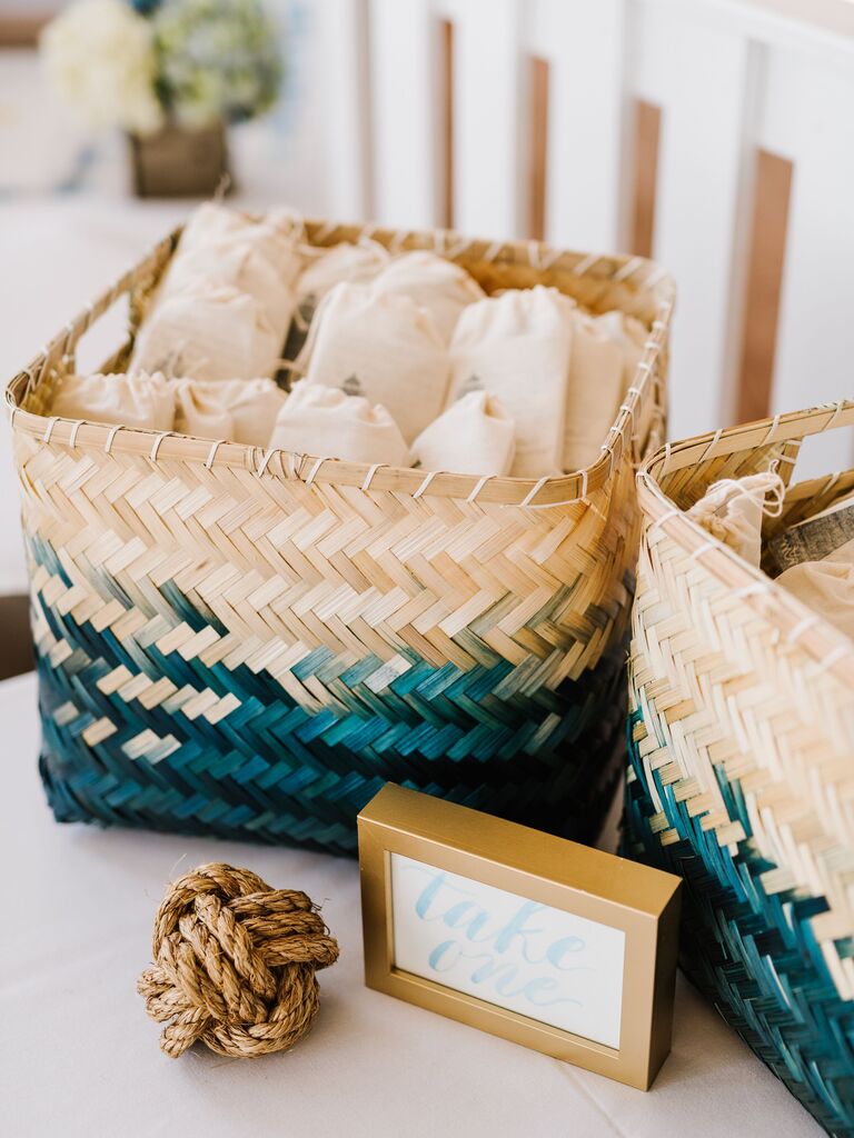 wedding favor display with square woven baskets with ombre blue pattern