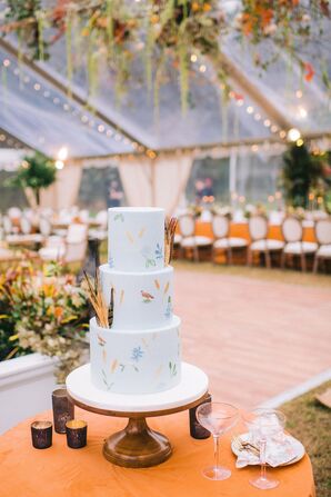 Patterned Pale Blue Wedding Cake With Pheasant Feathers