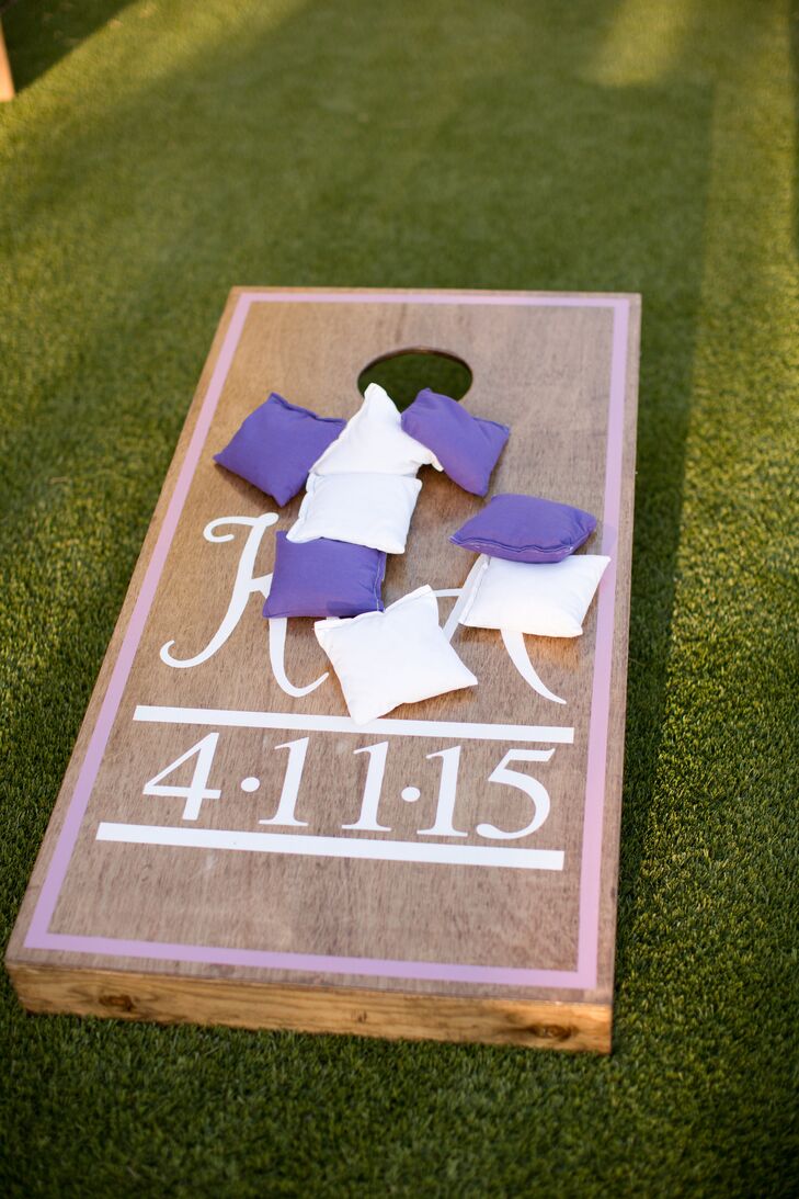 During cocktail hour on the El Churro patio and lawn, guests took in the views of Camelback Mountain, while sipping on signature cocktails and traditional Irish beers. To add an interactive element to the pre-dinner festivities, one of Aaron’s groomsmen handmade a set of corn hole boards customized with the couple’s initials and wedding date for guests to use.
