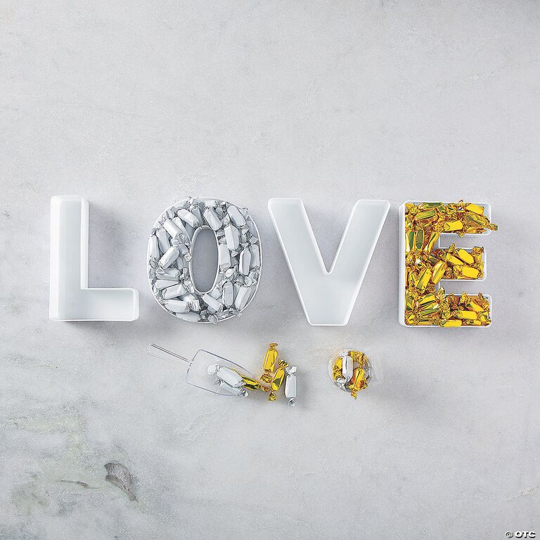 White "LOVE" snack bowls.