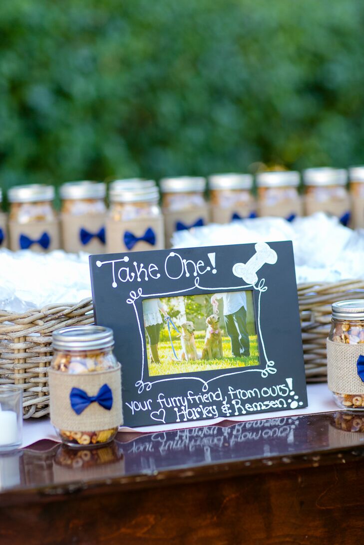 Guest went home with sweet treats for themselves and their dogs. For the humans, Lauren and her mother made dozens of DIY mason jar favors filled with her grandmother’s Chex Mix-inspired treats. “They were a huge hit and people were taking several jars on their way out,” Lauren says. Of course, they couldn’t forget about their furry friends, so Lauren and Andy also gave out doggie treats as favors.