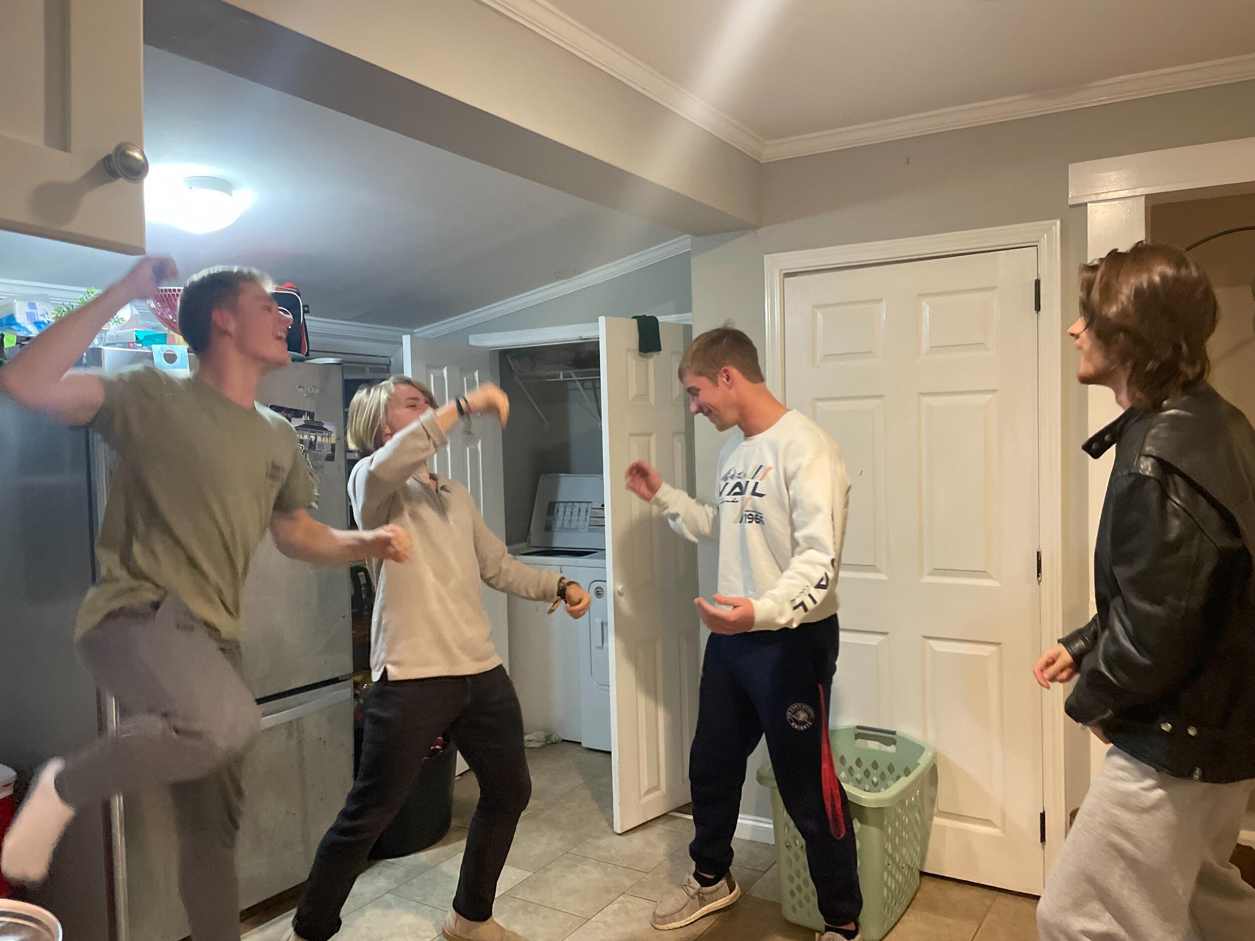 The day we made things official - Ethan celebrates with his roommates (shoutout OTS).