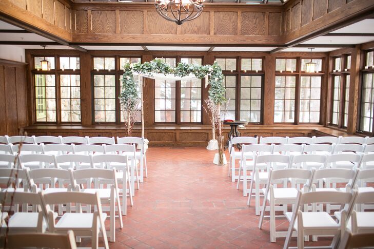The day began with an interfaith ceremony in the Willowdale Estate’s conservatory. The wood-paneled walls brought a warm, cozy feel to the space, while bright skylights and windows looking out onto the snow-dusted property gave guests a sense of being in the great outdoors. “It was beautiful at dusk on a wintry evening,” says Edith.