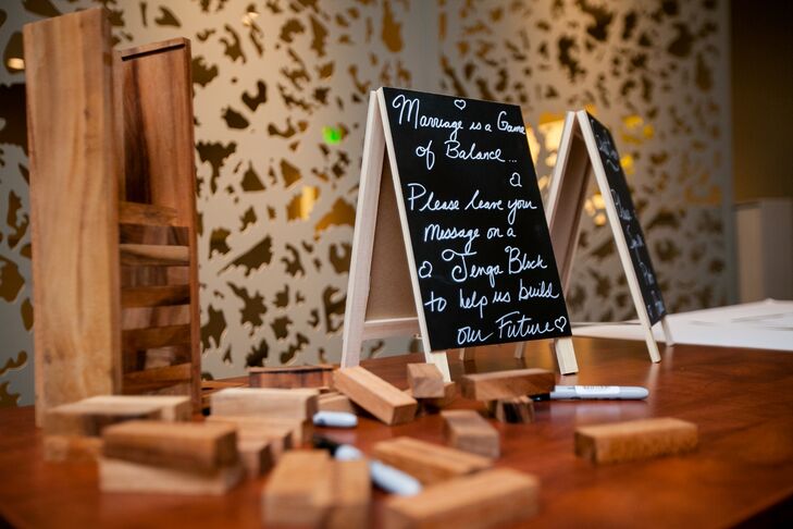 Dawn and Chad had attendees sign Jenga blocks instead of a traditional guest book. This way the couple can remember their friends and family whenever they play their favorite game.