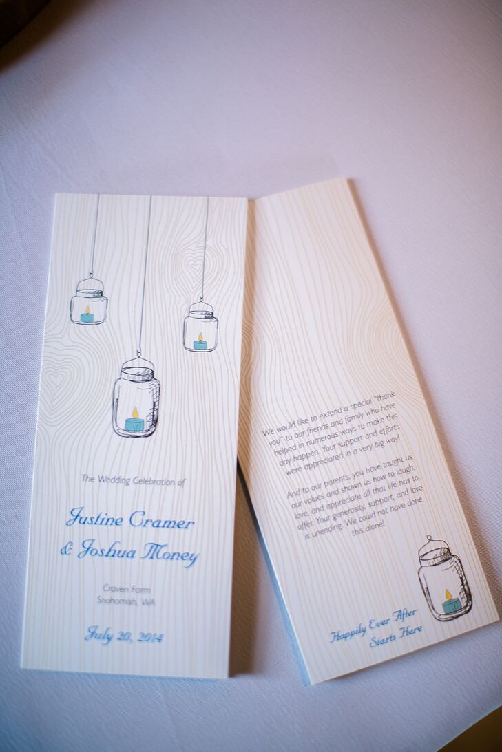 The ceremony programs were etched into wood panels with hanging mason jar designs.