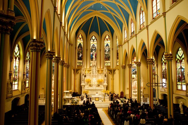 Wanting a traditional Catholic ceremony, Marielle and Roderick chose to host their ceremony at St. Monica's Church, which offered ample space for all of their guests, as well as breathtaking architecture.