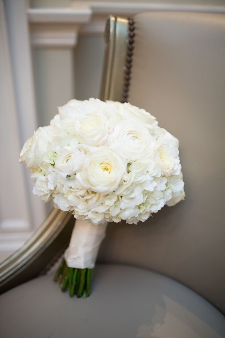White ranunculuses, hydrangeas and roses filled Megan's simple, elegant bridal bouquet