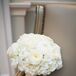 White ranunculuses, hydrangeas and roses filled Megan's simple, elegant bridal bouquet