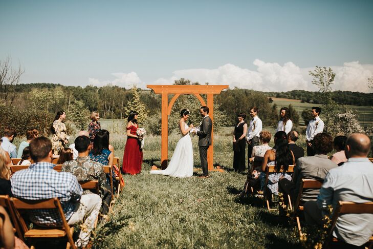Casual Backyard Ceremony with Wooden Arch in Lake Leelanau, Michigan