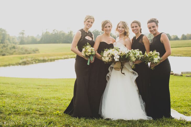 The bridesmaids looked chic in floor length black dresses from Rent the Runway. Shayne looked effortlessly stunning in a "Confections" by Monique Lhuiller ball gown.