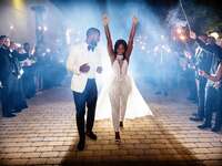 Couple leaving wedding reception