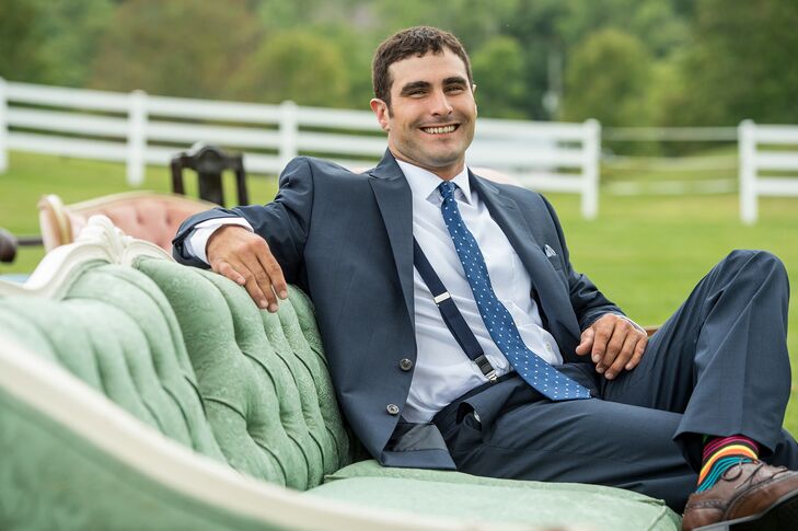 The groom wore a checked, navy blue suit from Ralph Lauren with funky socks, which were also given as gifts to the groomsmen.
