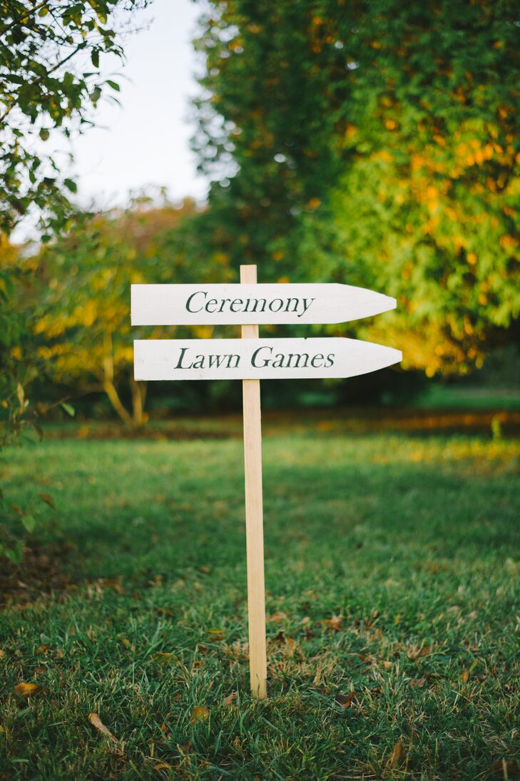 White and Black Wooden Ceremony Sign