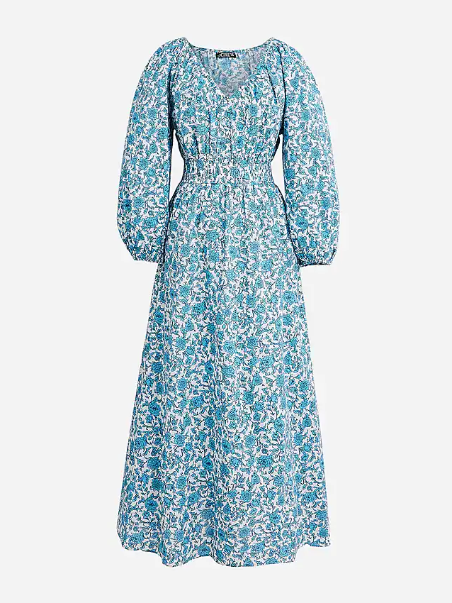 Blue long-sleeve dress with a botanical pattern from top to bottom