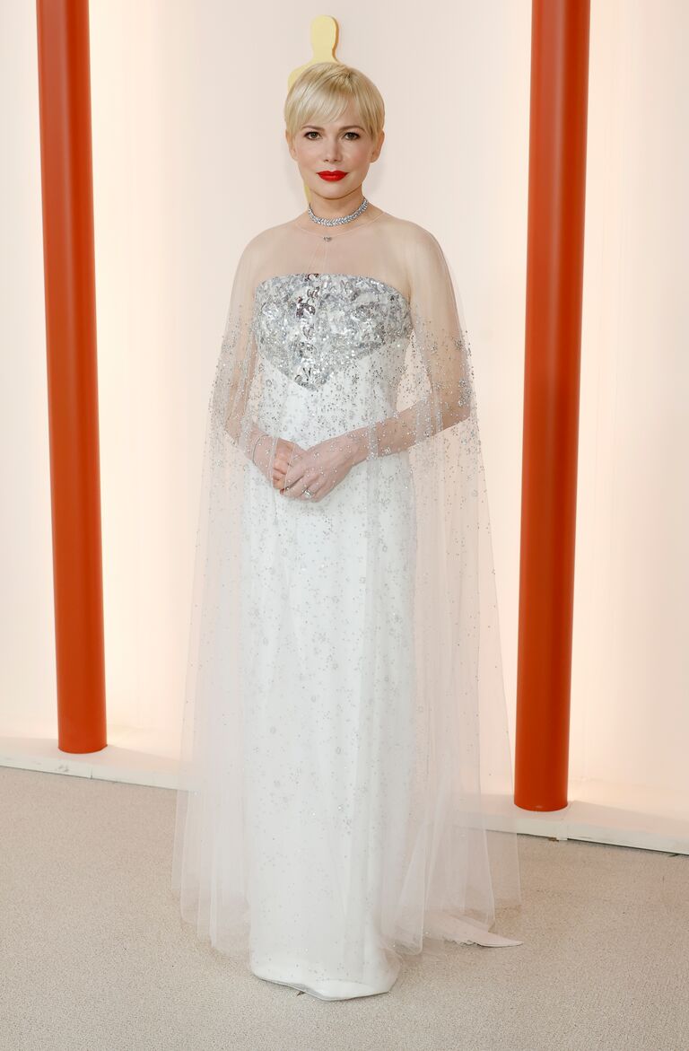 Michelle Williams in a white wedding-inspired diamond column gown at the 2023 Oscars