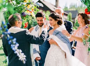 Color, and lots of it, was the name of the game at Gaby and Jake's wedding in the mountains of Tabernash, Colorado, at Devil's Thumb Ranch. "We wanted