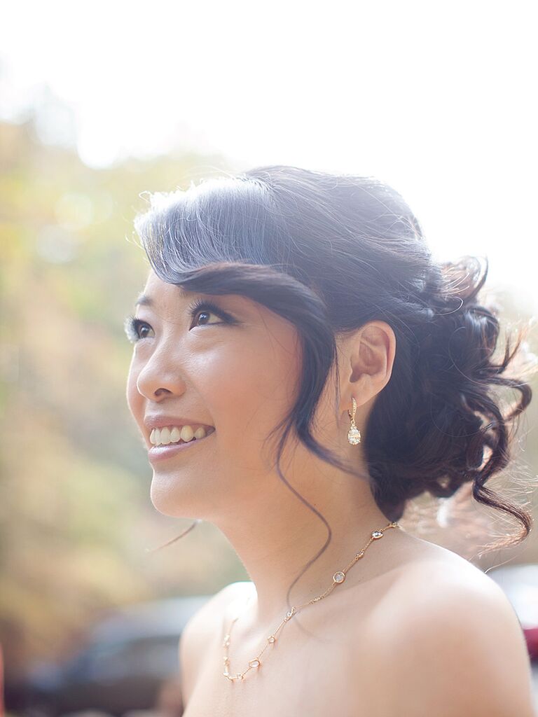 Messy pin-up bun wedding hairstyle