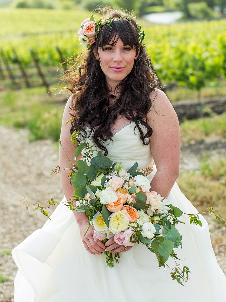 Greenery flower crown with a cluster of garden roses to the side