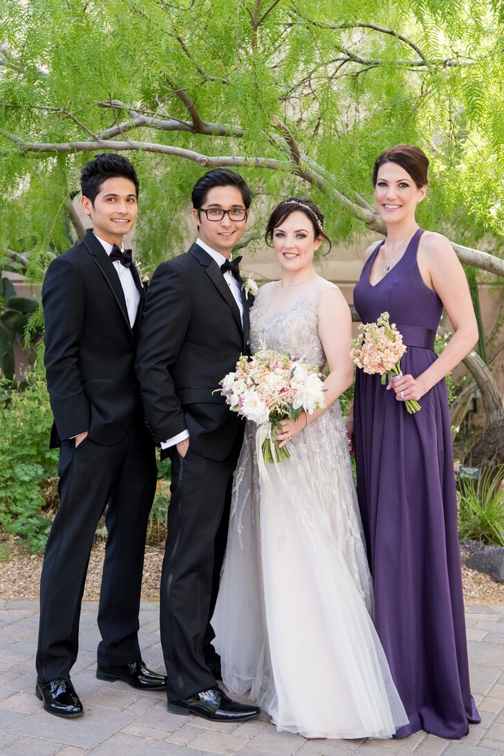 The only bridesmaid in the wedding party, Anna’s best friend of over 20 years, wore a floor-length amethyst Vera Wang gown; the best man wore a tux with matching purple elements.