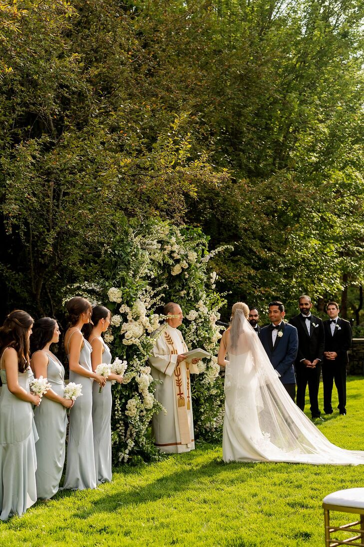 Garden Wedding Ceremony With Flower Arch