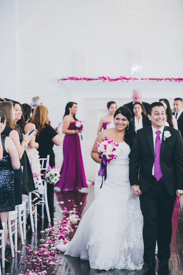 The couple chose string quartet versions of modern pop songs for their ceremony music—Coldplay's "A Sky Full of Stars" for the bridal party and Bruno Mars's "Just the Way You Are" for Jessica's entrance.