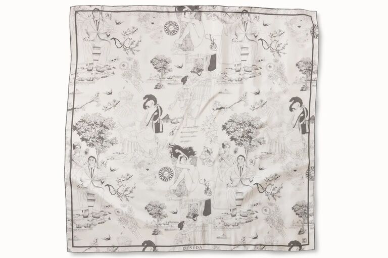 Artistic drawings on black and white headscarf