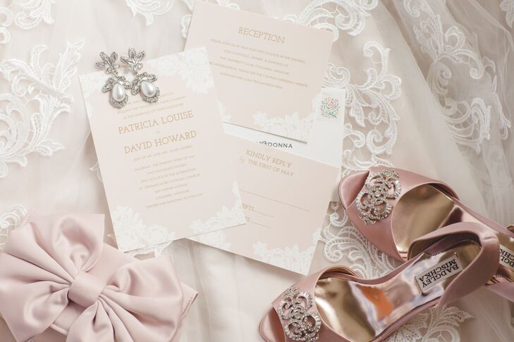 Tricia's invitations and accessories kept to a soft, romantic palette of champagne and blush pink.