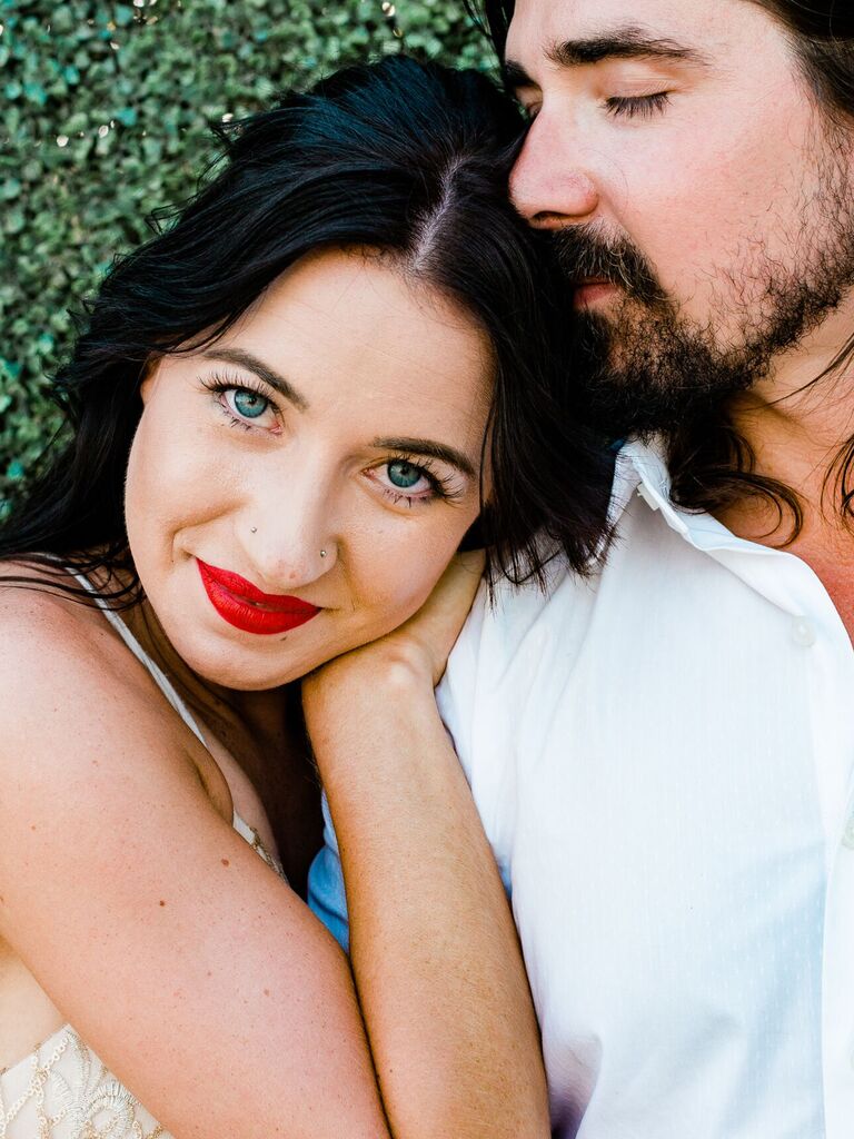 wedding makeup dark lashes bright red lipstick