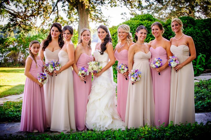 Kassandra wore a beautiful strapless Vera Wang dress with a voluminous tulle skirt. She bought her dress at a bridal show for Brides Against Breast Cancer, a nonprofit organization whose proceeds go to helping those afflicted by breast cancer. Kassandra's bridesmaids wore strapless, floor-length gowns in pink and taupe.
