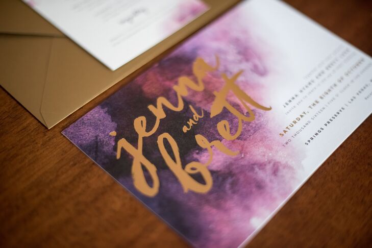 The day's rich palette of plum and gold was reflected in the invitation suite, which had a soft watercolor theme.