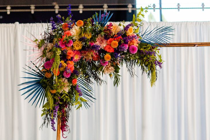Modern Colorful Flower Arrangement with Roses, Dahlias and Painted Palm Leaves