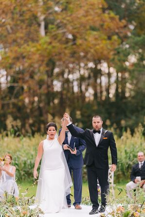 Couple Holding Hands During Farm Wedding Ceremony in Chadbourn, North Carolina