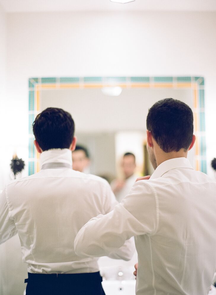 Brad and Michael started the day together and put on their designer suits with each other. They even helped perfect each other's bow ties.
