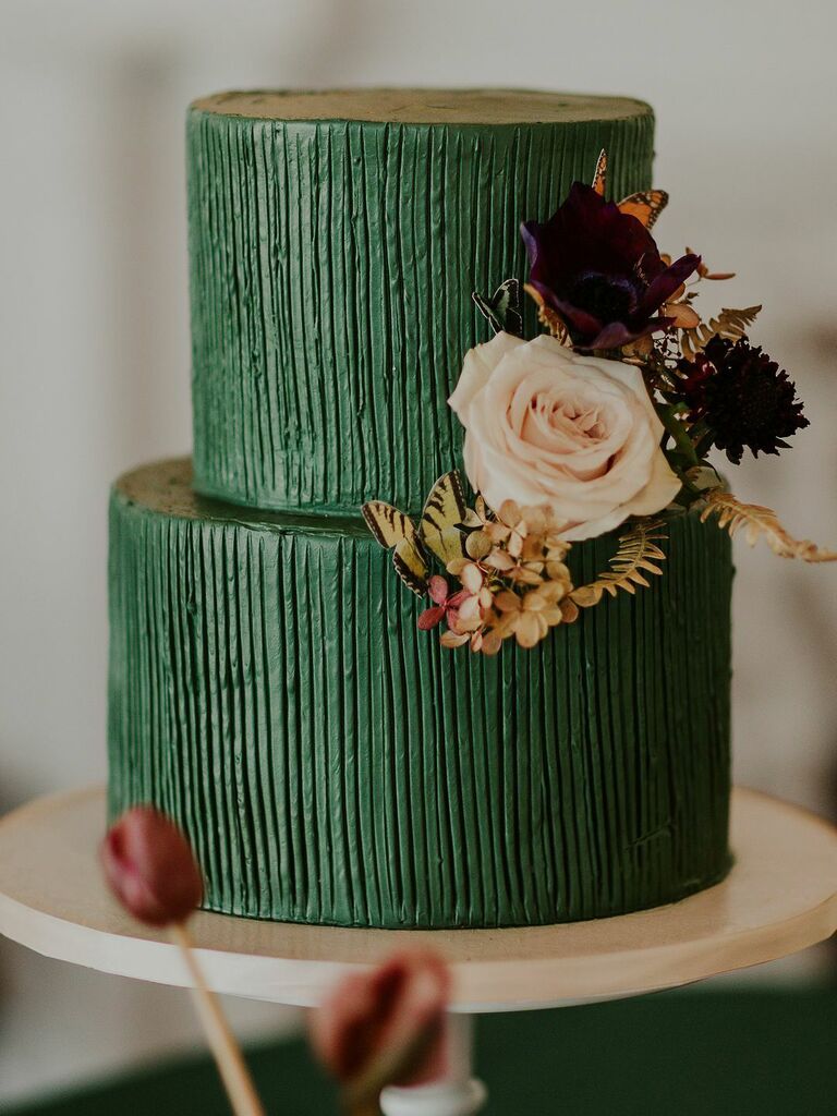 dark green fall wedding cake with textured fondant, pink and burgundy roses and faux yellow butterfly
