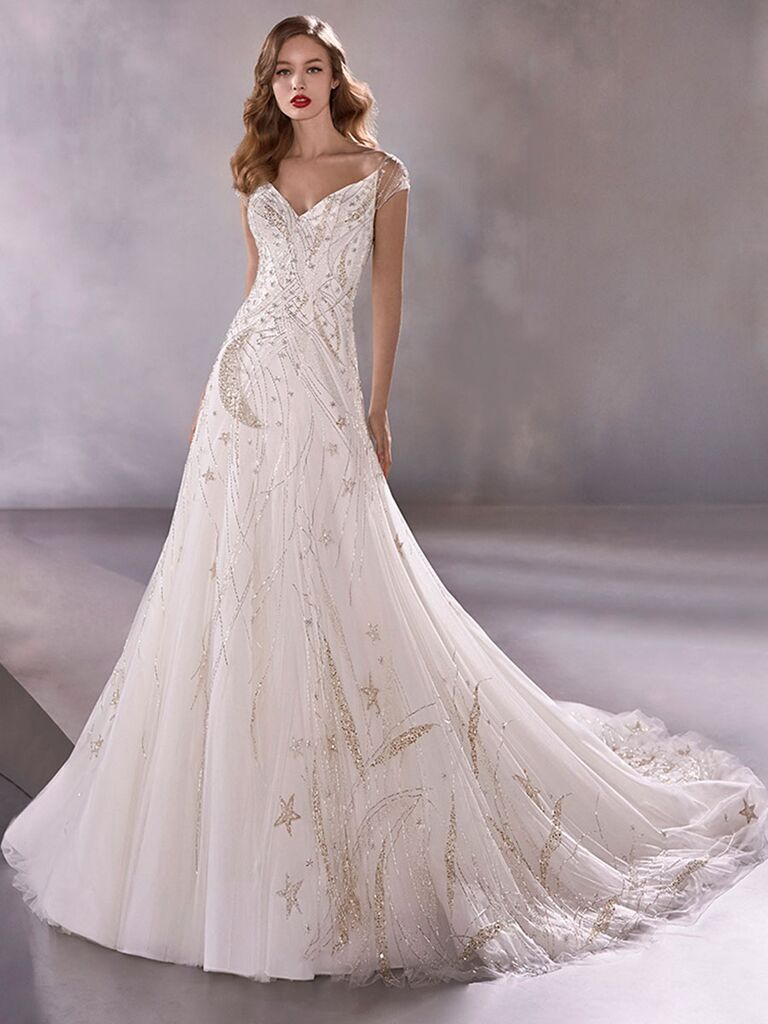Atelier Provonias wedding dress tulle a-line gown with beaded moons and stars