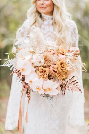 Bride Carrying A Blush-and-White Cascading Wedding Bouquet