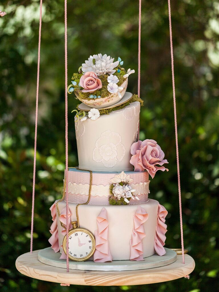 Pink "Alice in Wonderland"-themed fairytale wedding cake