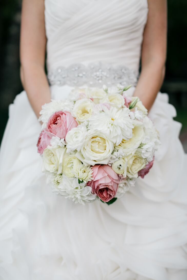 Joelle carried a romantic pink and white bouquet with peonies, roses, ranunculus and dahlias.