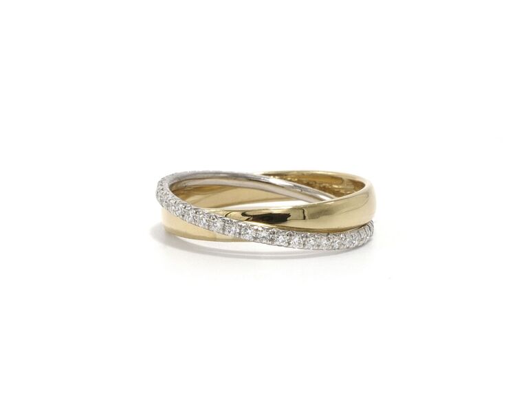 interconnected diamond band and yellow gold band ring